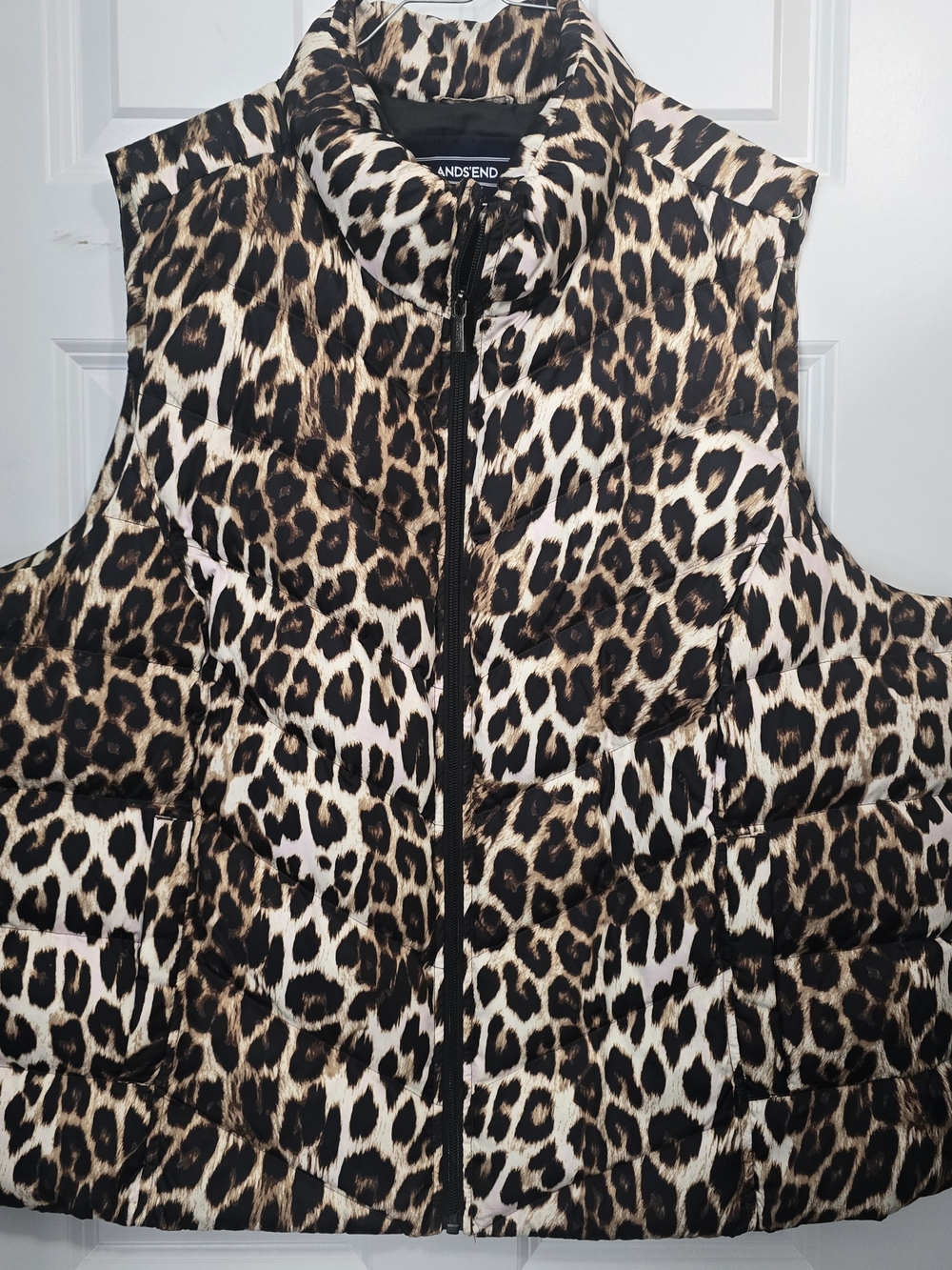 This is a Lands' End women's down puffer vest.
